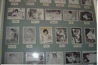 At the entrance to the hospital hang the pictures of children born at the hospital in 1960s and 1970s.